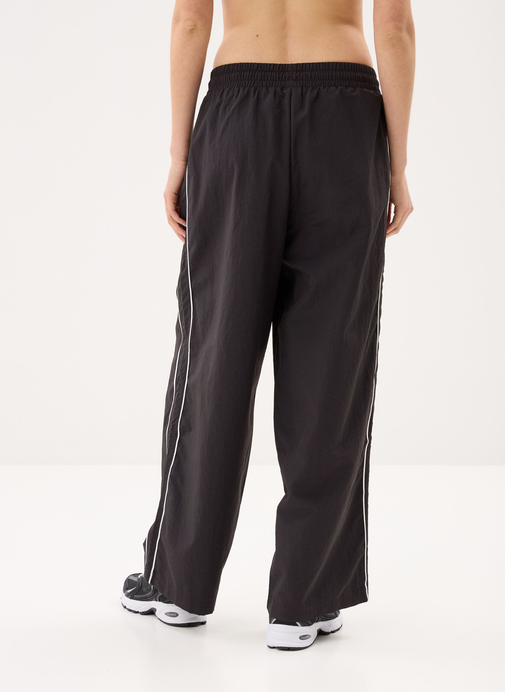 Jogginghosen T7 Piping Relaxed Woven Track Pants op damen schwarz Puma Jogginghosen T7 Piping Relaxed Woven Track Pants op damen schwarz PUMA BLACK