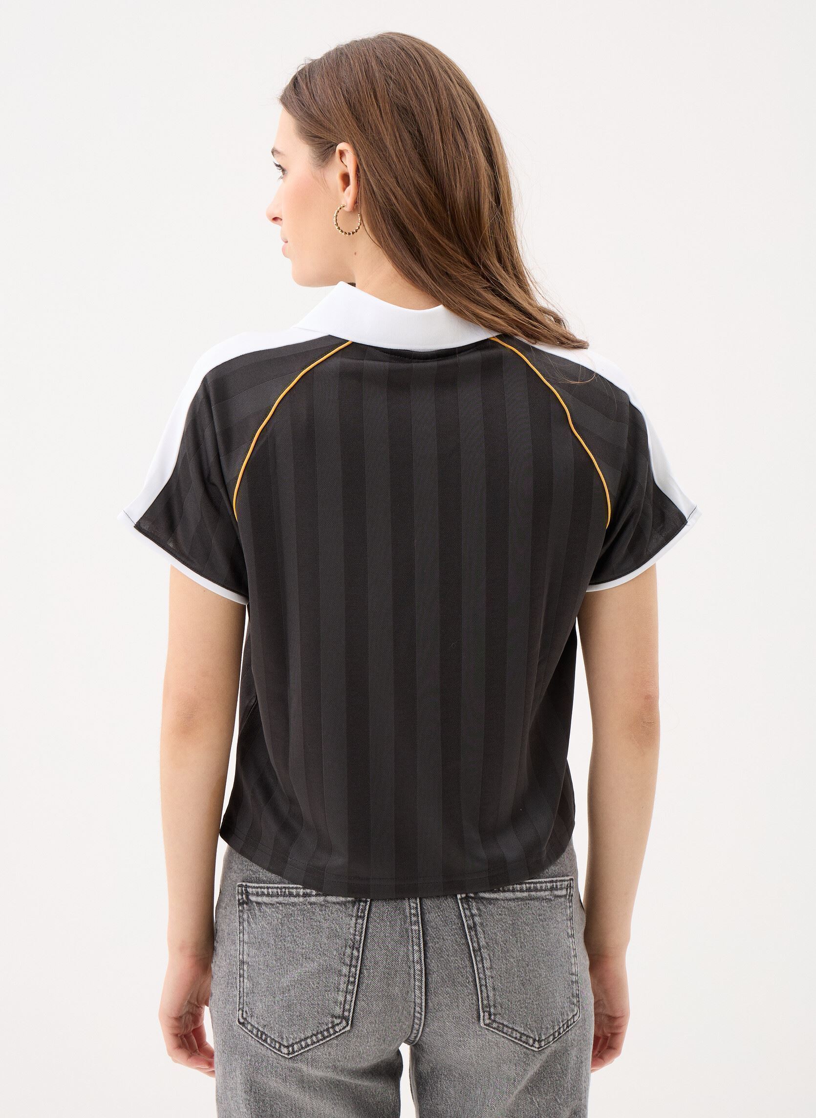 Kurzarm-Poloshirts T7 Relaxed Football Jersey damen schwarz Puma Kurzarm-Poloshirts T7 Relaxed Football Jersey damen schwarz PUMA BLACK