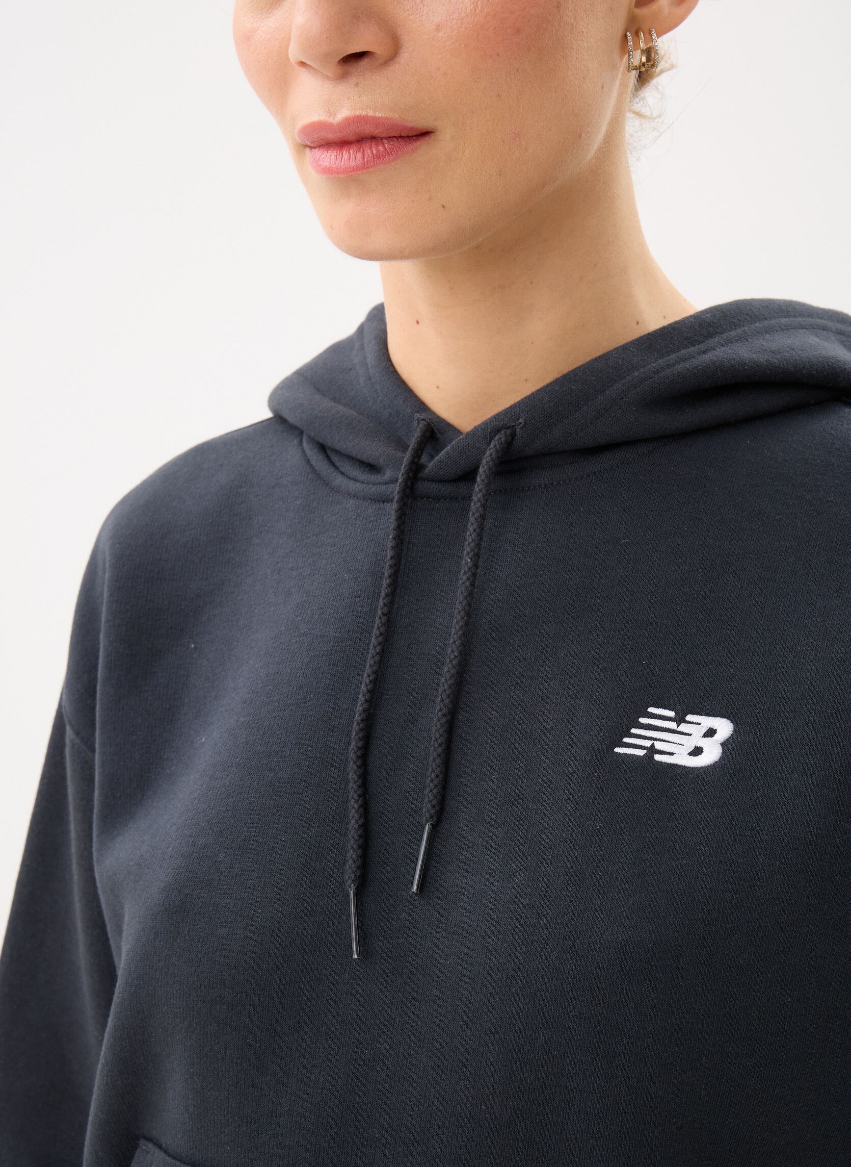 Kapuzenpullover Sport Essentials Fleece Hoodie damen schwarz New Balance Kapuzenpullover Sport Essentials Fleece Hoodie damen schwarz BLACK