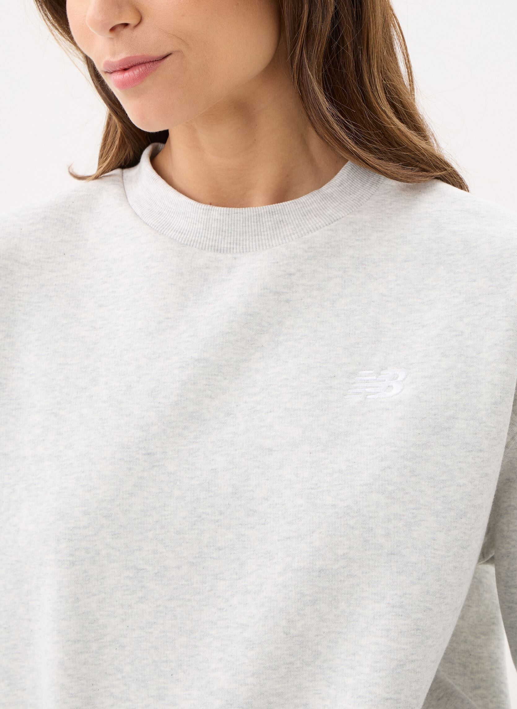 Sweater Sport Essentials Fleece Crew W dames grijs New Balance Sweater Sport Essentials Fleece Crew W dames grijs ASH HEATHER