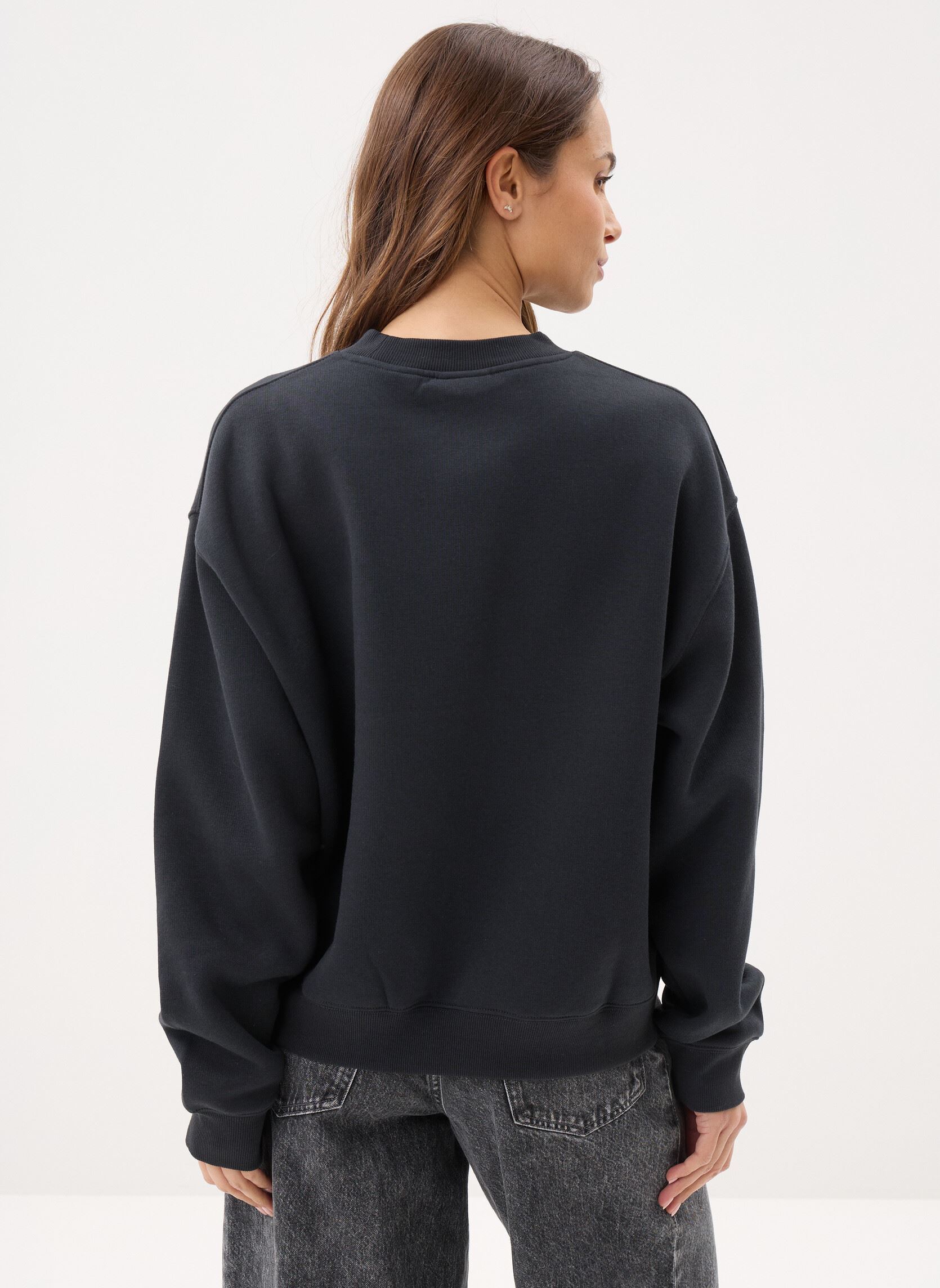 Sweatshirts Sport Essentials Fleece Crew W femme noir New Balance Sweatshirts Sport Essentials Fleece Crew W femme noir BLACK