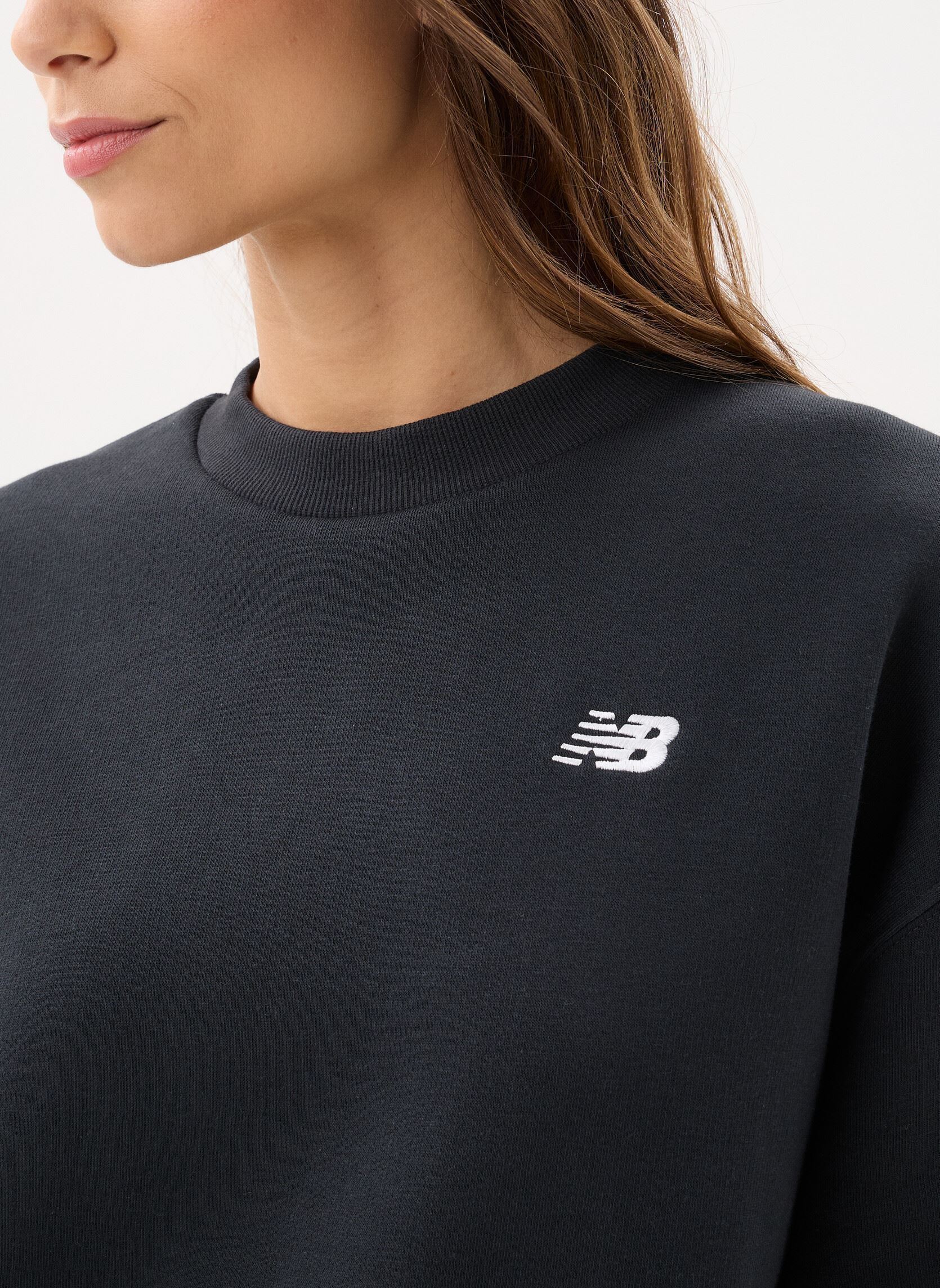 Sweatshirts Sport Essentials Fleece Crew W femme noir New Balance Sweatshirts Sport Essentials Fleece Crew W femme noir BLACK