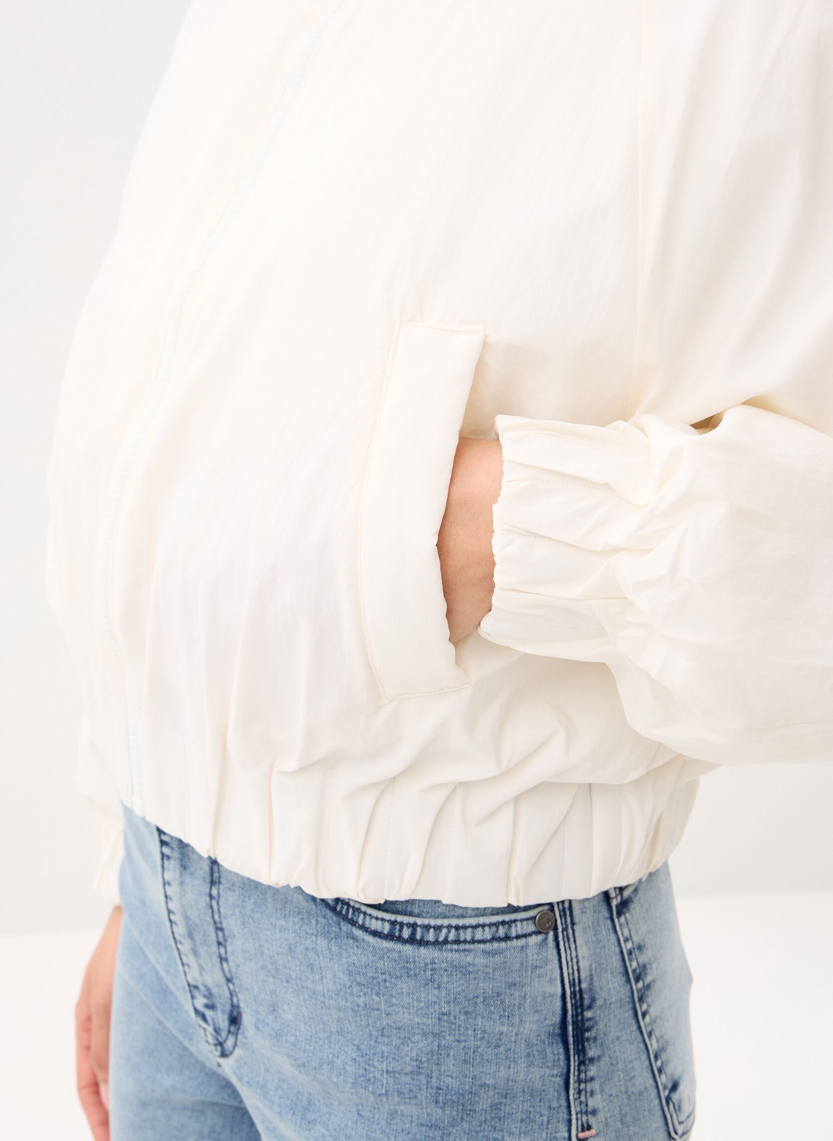 Blousons Woven Bomber Jacket femme blanc New Balance Blousons Woven Bomber Jacket femme blanc Sea salt