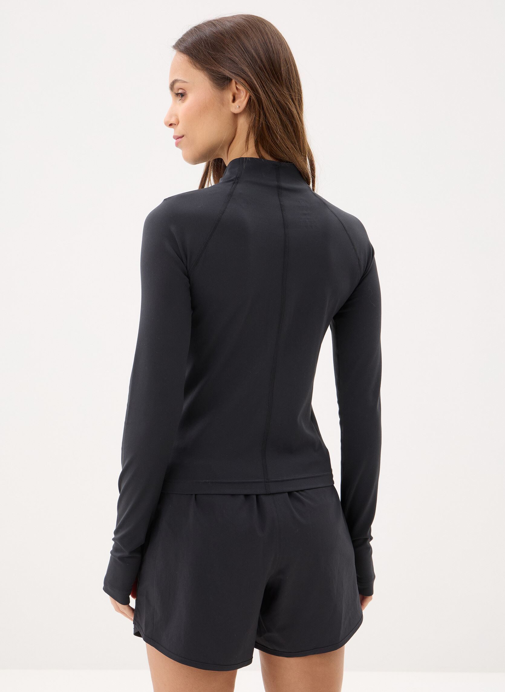 Vestes de survêtement NB Harmony Fitted Full Zip femme noir New Balance Vestes de survêtement NB Harmony Fitted Full Zip femme noir Black