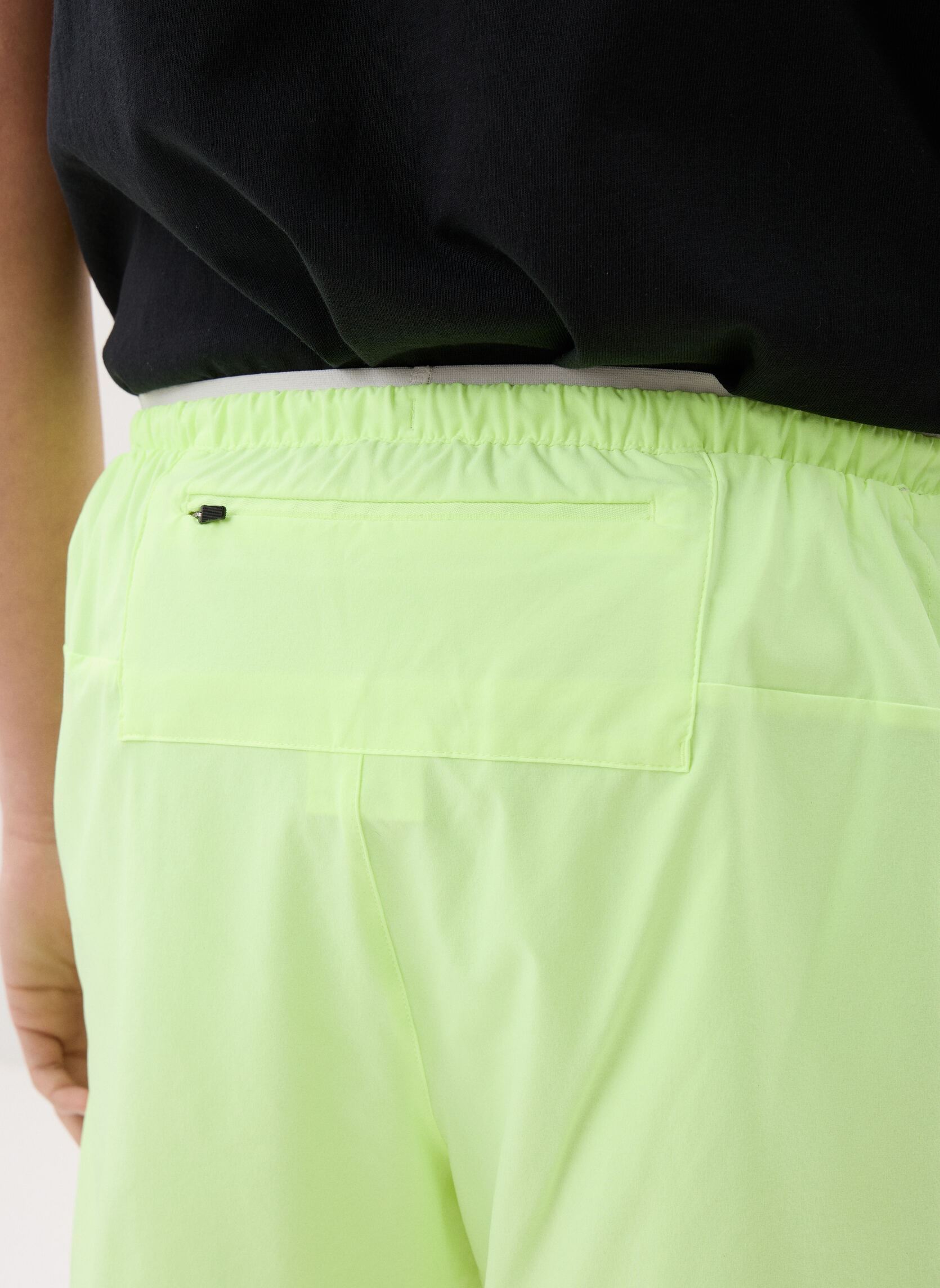 Shorts de sport RC Essential Short 5 homme jaune New Balance Shorts de sport RC Essential Short 5 homme jaune Afterglow
