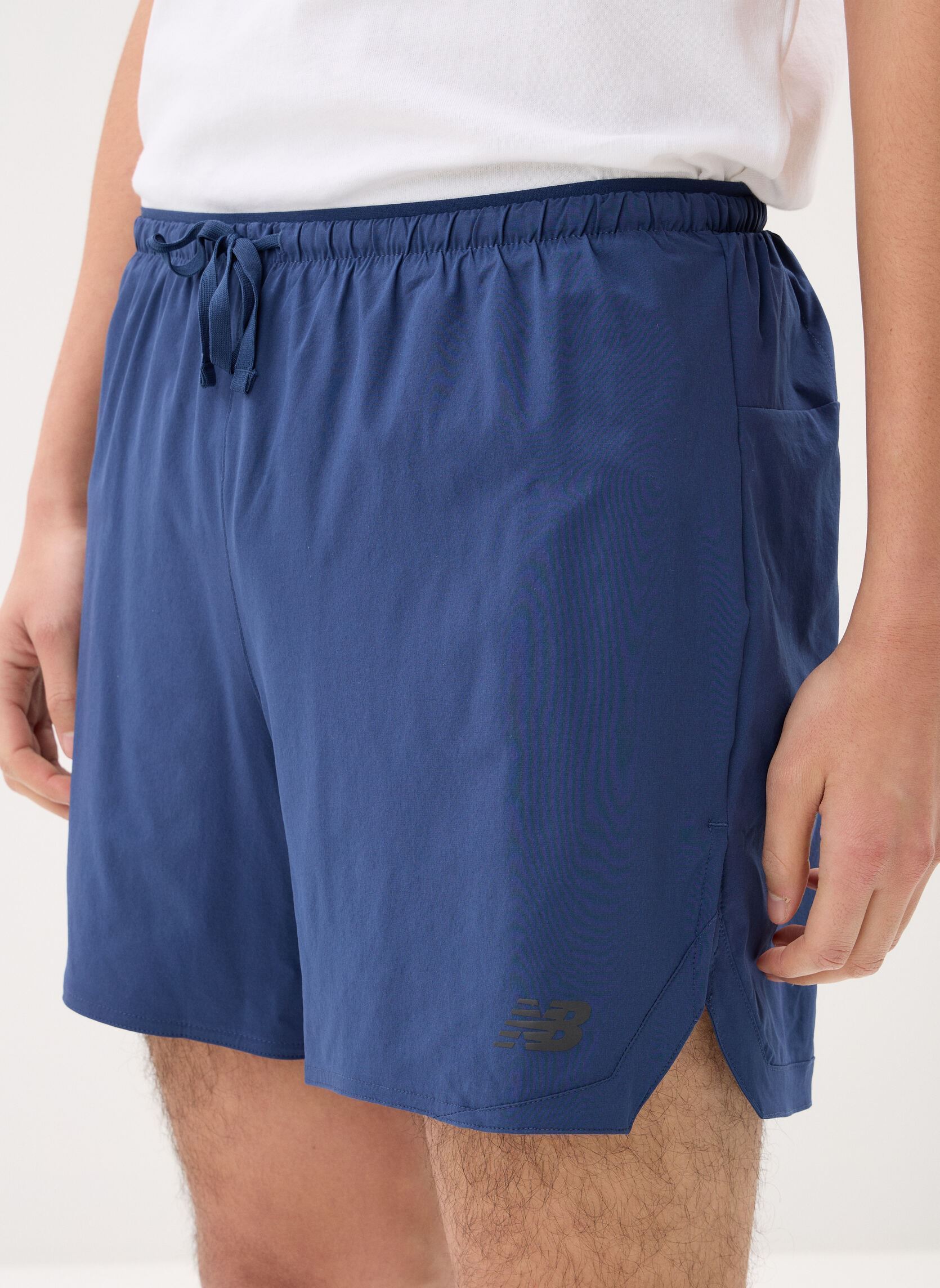 Shorts de sport RC Essential Short 5 homme bleu New Balance Shorts de sport RC Essential Short 5 homme bleu NB navy