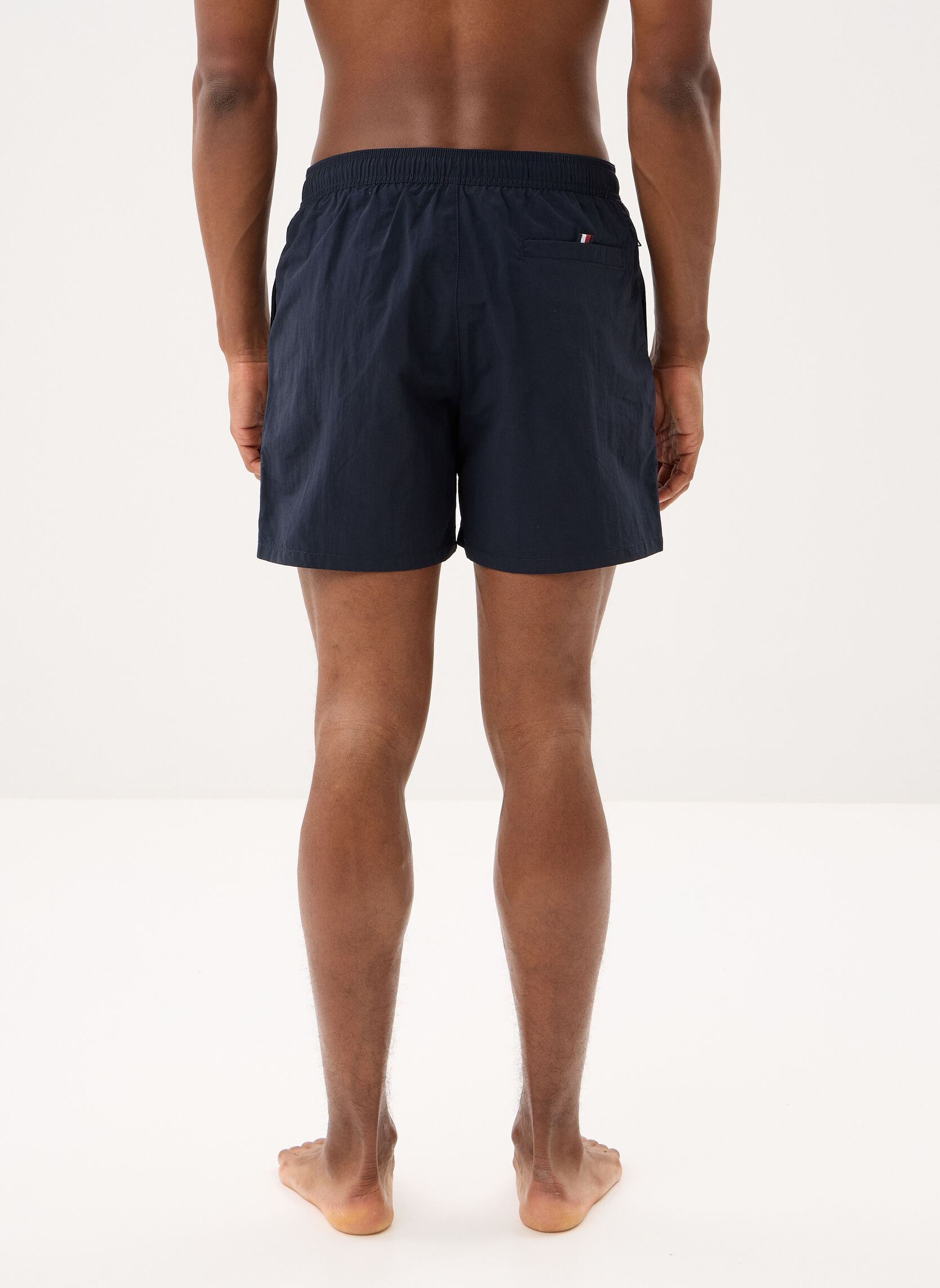 Shorts de bain Medium Drawstring Zi UM0UM03748 homme bleu Tommy Hilfiger Shorts de bain Medium Drawstring Zi UM0UM03748 homme bleu DESERT SKY