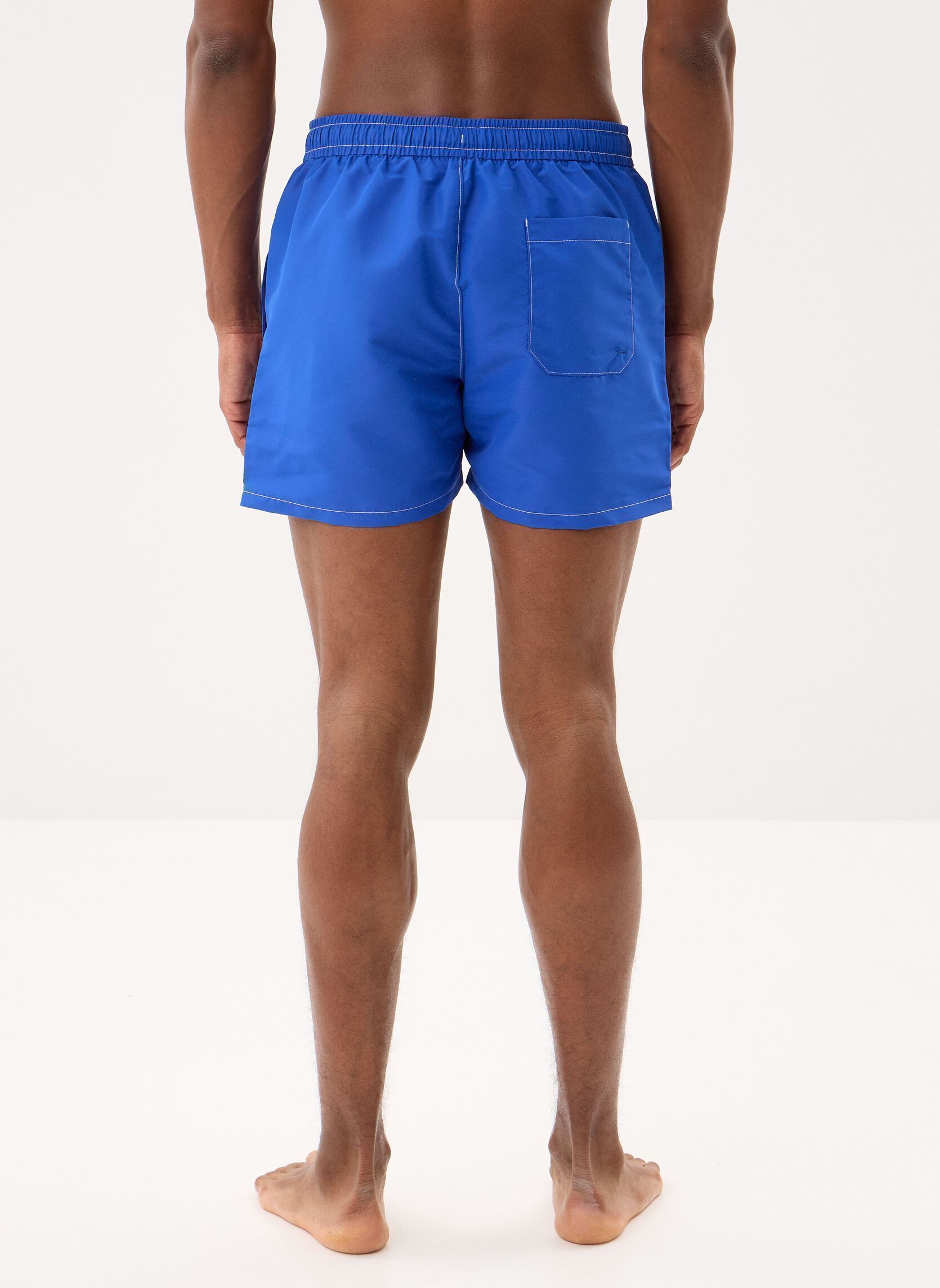 Zwemshorts Tj Medium Drawstring UM0UM03852 heren blauw Tommy Hilfiger Zwemshorts Tj Medium Drawstring UM0UM03852 heren blauw FIZZY BLUE