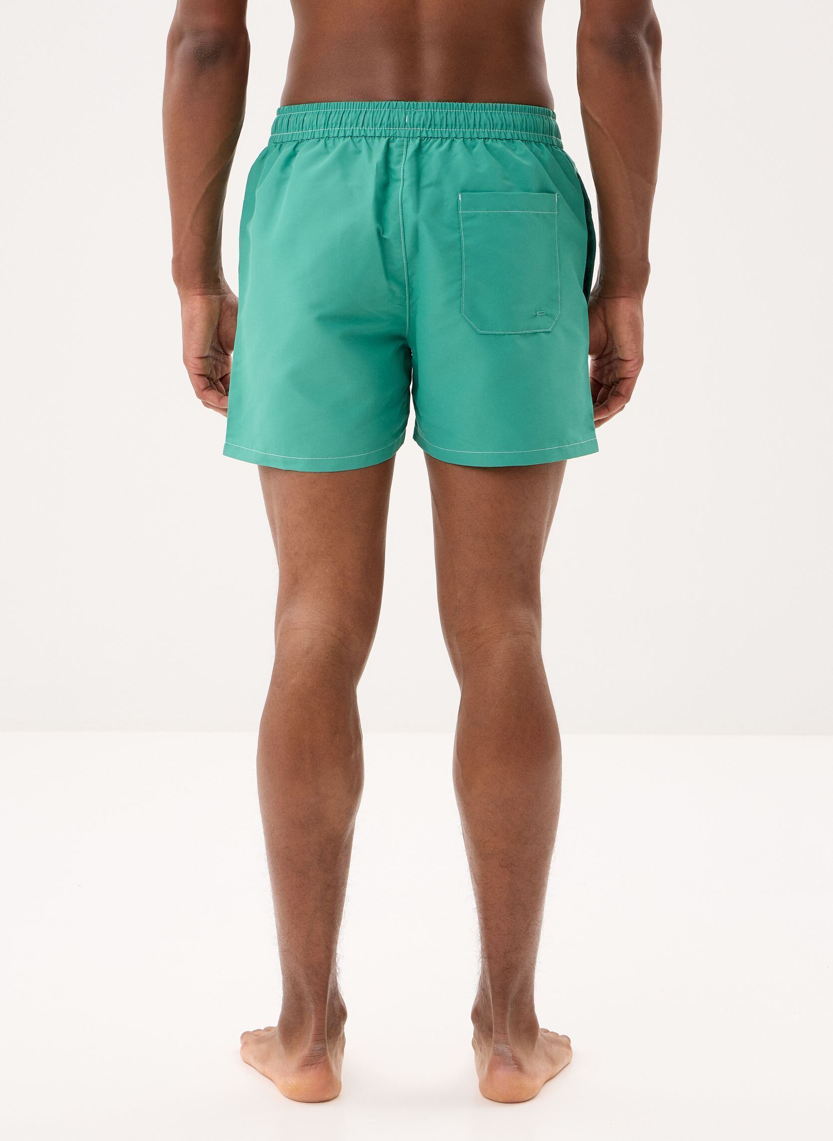 Shorts de bain Tj Medium Drawstring UM0UM03852 homme vert Tommy Hilfiger Shorts de bain Tj Medium Drawstring UM0UM03852 homme vert BAHAMA GREEN