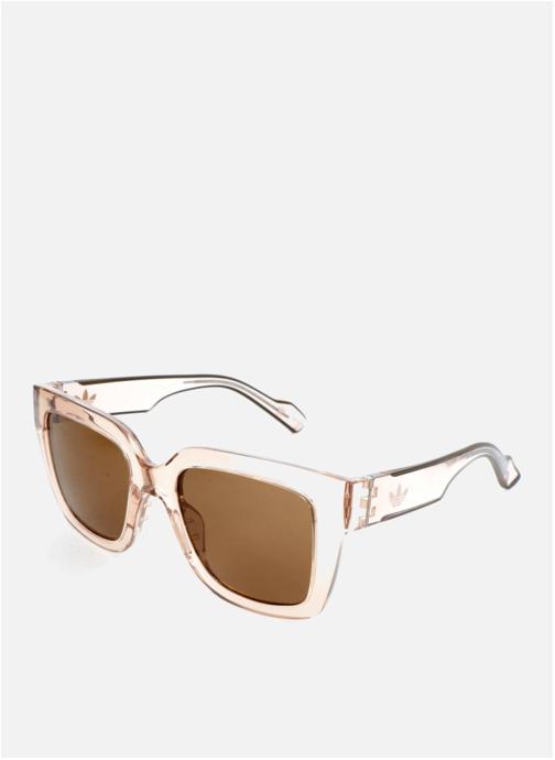 adidas sportswear Lunettes de soleil femme beige